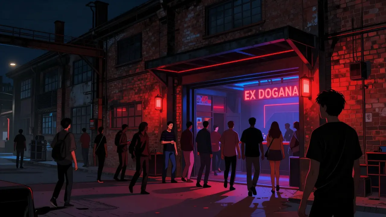 Crowd entering Ex Dogana, an industrial warehouse nightclub with neon glow and urban atmosphere.